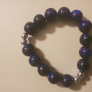 Handmade by my daughter. Elegant Deep Blue and Silver Beaded Bracelet